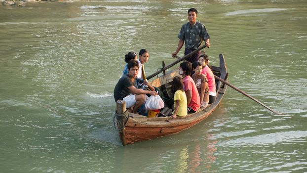 Sittwe, Rakhine State, Myanmar - October 16, 2014: Ferry taking commuters across to the harbour of Sittwe, the capital of the Rakhine State in Myanmar.