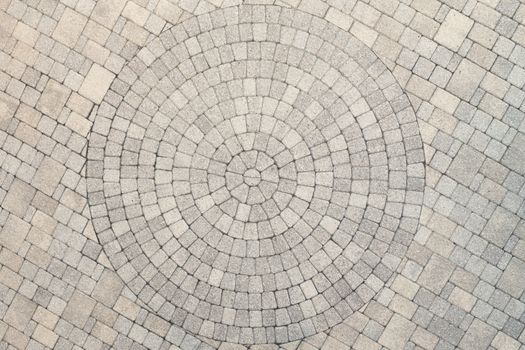Center view of patio pavers circle design overhead view. Showing well detail  cutted edges to match to the circle design