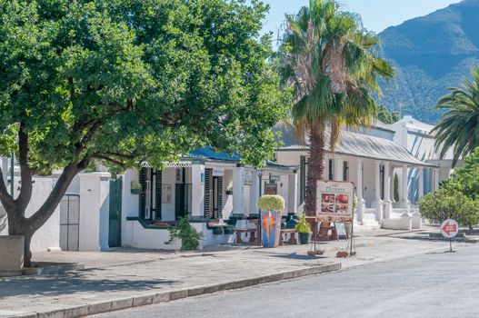 GRAAFF REINET, SOUTH AFRICA - JANUARY 6, 2015: Late afternoon street scene. More than 200 buildings in the town are declared as a national monuments