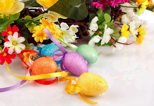 Easter eggs with flowers on a white background