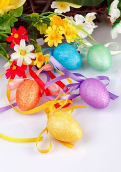 Easter eggs with flowers on a white background