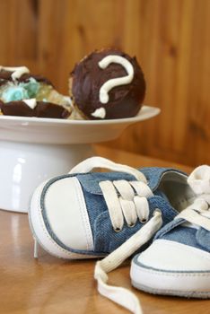 Photo 8 of an event held in revealing the gender of a new mothers baby done in a unique photo series using mystery cupcakes to let people know if its a boy or girl.