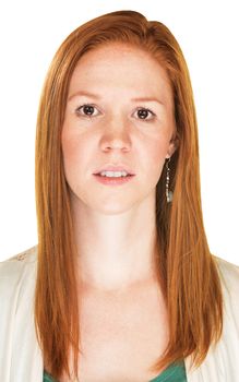 Cautious young European female with red hair over white