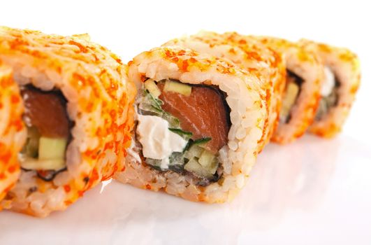 traditional fresh japanese sushi rolls on a white background