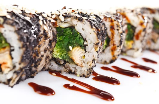 Traditional japanese sushi  with sauce isolated on white background