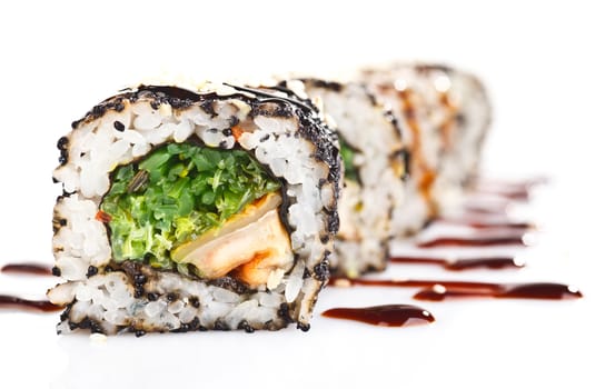 Traditional japanese sushi  with sauce isolated on white background