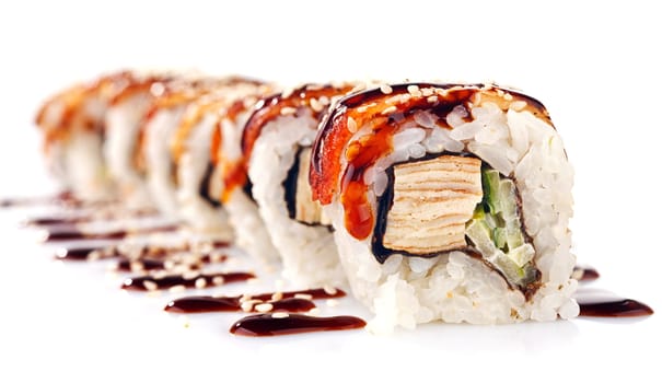 Traditional japanese sushi  with sauce isolated on white background