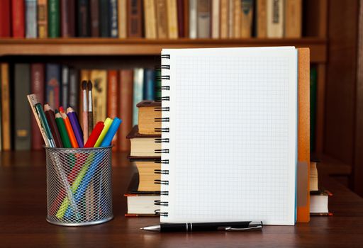 open notebook on the table with office stationery with space for text