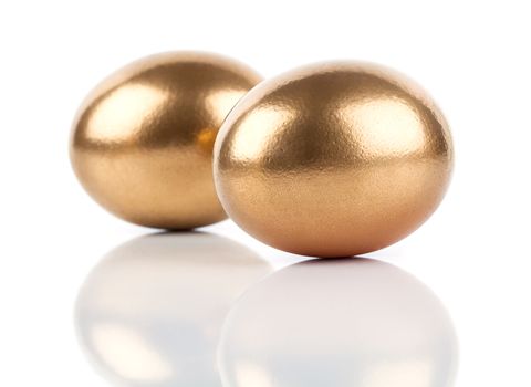 golden eggs isolated on white background