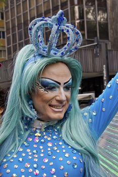 SAO PAULO, BRAZIL - June 7, 2015: An unidentified Drag Queen dressed in traditional costume celebrating lesbian, gay, bisexual, and transgender culture in the 19º Pride Parade Sao Paulo.