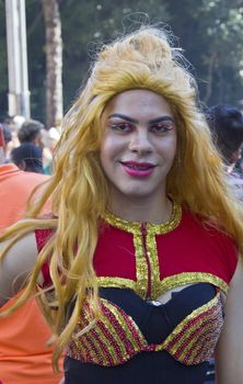 SAO PAULO, BRAZIL - June 7, 2015: An unidentified Drag Queen dressed in traditional costume celebrating lesbian, gay, bisexual, and transgender culture in the 19º Pride Parade Sao Paulo.