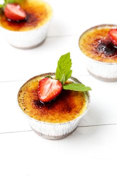 Dessert. Delicious creme brulee on the table