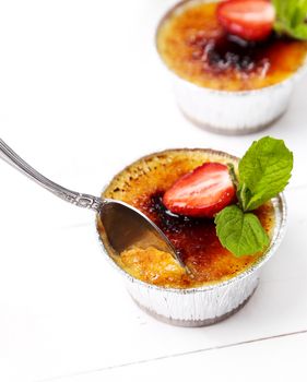 Dessert. Delicious creme brulee on the table