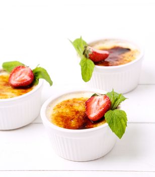 Dessert. Delicious creme brulee on the table