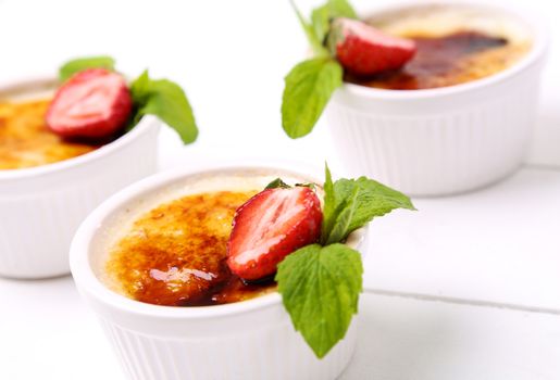 Dessert. Delicious creme brulee on the table