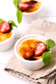 Dessert. Delicious creme brulee on the table