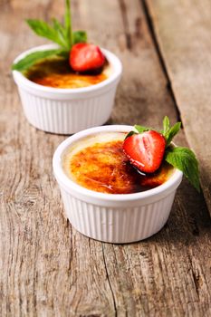 Dessert. Delicious creme brulee on the table