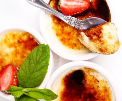 Dessert. Delicious creme brulee on the table