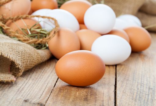 Eggs on wooden background