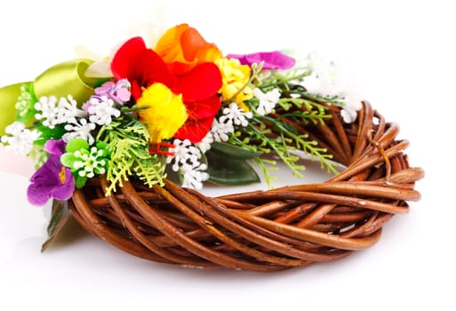 wreath of twigs and flower composition isolated on white