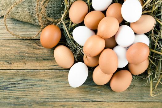 Eggs on wooden background