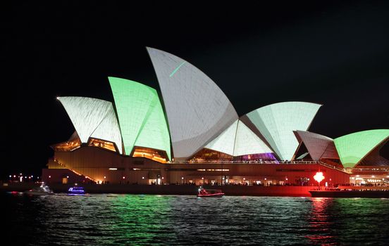 SYDNEY, AUSTRALIA - MAY 23, 2015;  Sydney Opera House  illuminated in metallic grey and green colours during Vivid Sydney annual festival.