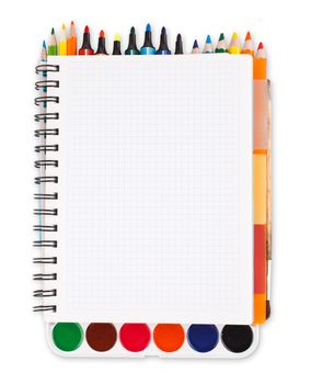 notebook with school supplies on a white background with space for text, clipping path