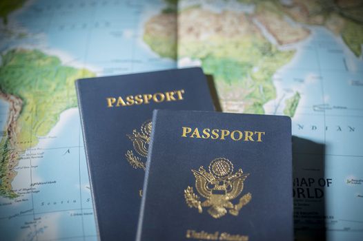 Passports on a map of the world with limited depth of field