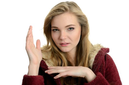 Young, blond model wearing red top. Female model with hands gesture.