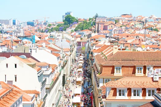  Aerial view of the Augusta Street and the Downtown District, known as Baixa. The most cosmopolitan street of the city is permanently full with Lisboans and tourists