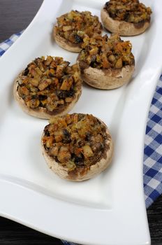 champignons with vegetable stuffing on a platter