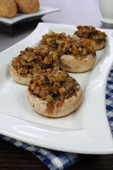 champignons with vegetable stuffing on a platter