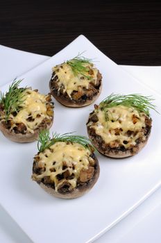 champignons with vegetable stuffing and cheese