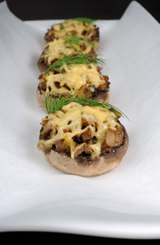 champignons with vegetable stuffing and cheese