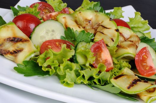 Salad of tomato, cucumber lettuce and zucchini