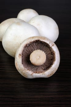 A bunch of fresh mushrooms on the table close-up