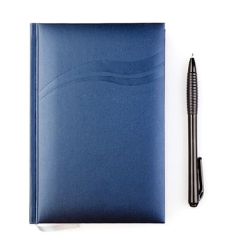 notebook with pen  on a white background