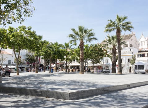 people sitting on the teracces and relax in albufeira 