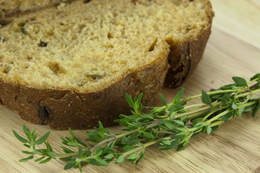 Loaf of wholemeal brown bread cut ready to serve