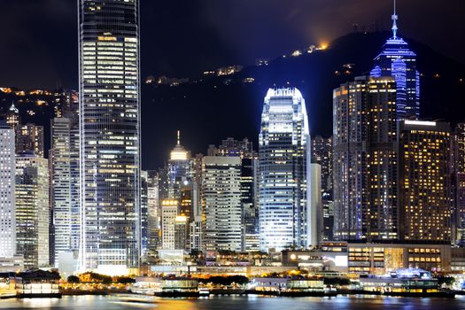 hong kong office buildings at night, shoot from kowloon side