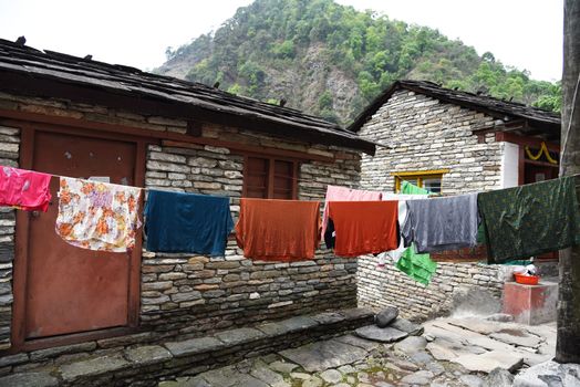 closed up the clothes are hanging on clothe line in village , Nepal