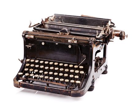 Vintage black typewriter isolated on white background.