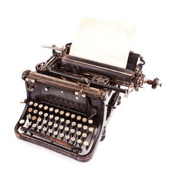 Vintage black typewriter isolated on white background.