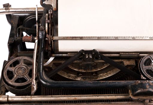 blank sheet of paper in an old typewriter