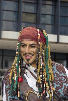 SAO PAULO, BRAZIL - June 7, 2015: An unidentified man  wearing costume and celebrating lesbian, gay, bisexual, and transgender culture in the 19º Pride Parade Sao Paulo.