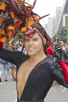 SAO PAULO, BRAZIL - June 7, 2015: An unidentified man  wearing costume and celebrating lesbian, gay, bisexual, and transgender culture in the 19º Pride Parade Sao Paulo.