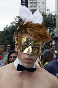 SAO PAULO, BRAZIL - June 7, 2015: An unidentified man  wearing costume and celebrating lesbian, gay, bisexual, and transgender culture in the 19º Pride Parade Sao Paulo.