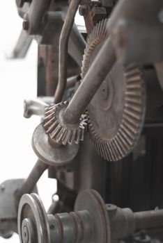 Old rusty gears printing press