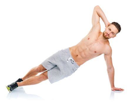 Sport attractive man doing fitness exercises on the white background