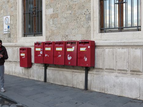 SIENA, ITALY - DECEMBER 19, 2014: row of letter box mailboxes for sending mail